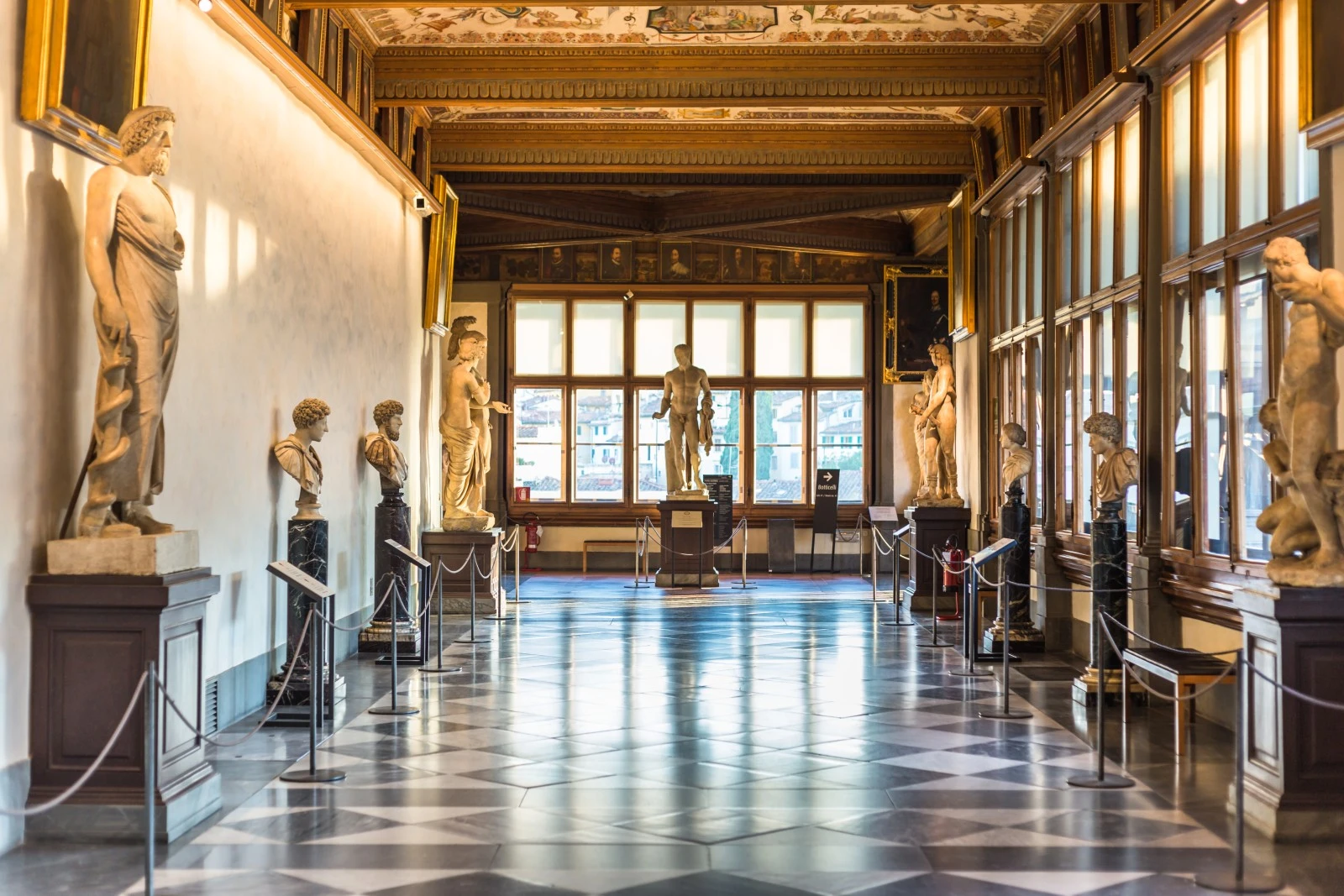 Ancient sculptures in Uffizi corridors